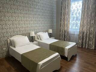 Мини-отель Белое Озеро Томск Номер стандарт с 2 односпальными кроватями-1
